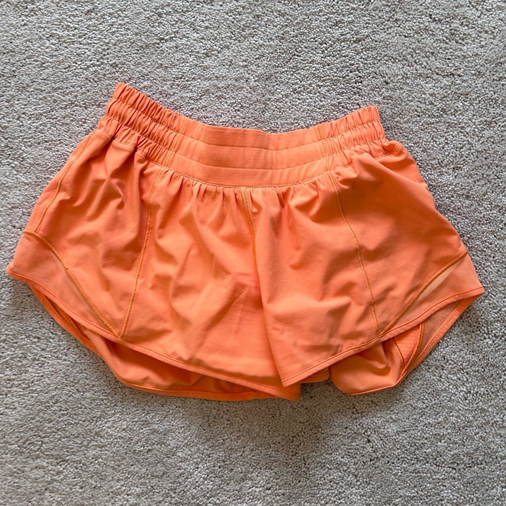 Lululemon neon orange 2.5 inch size 4